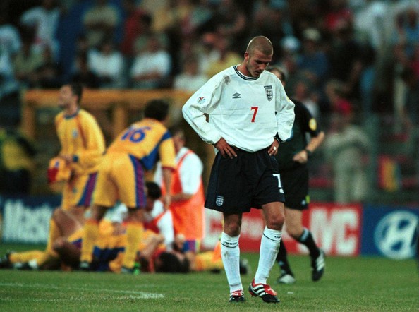 David Beckham looks on dejected 